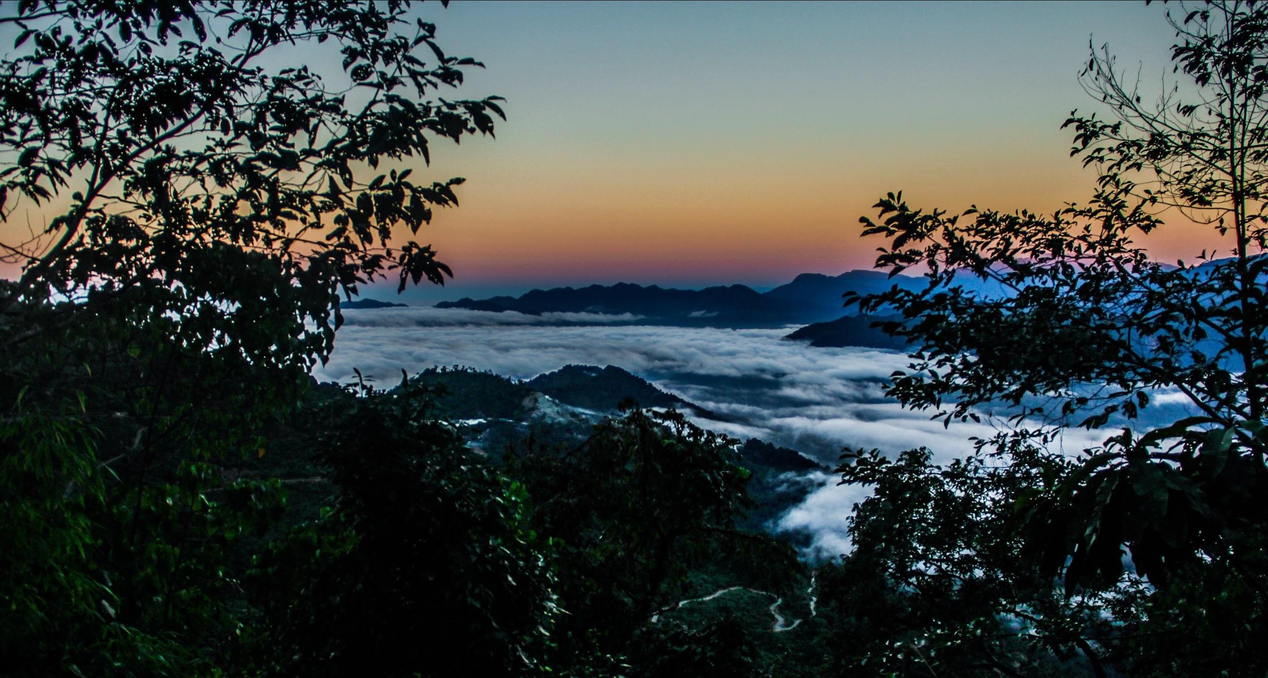 Mountain ridges above a sea of cloud near Phuentsholing